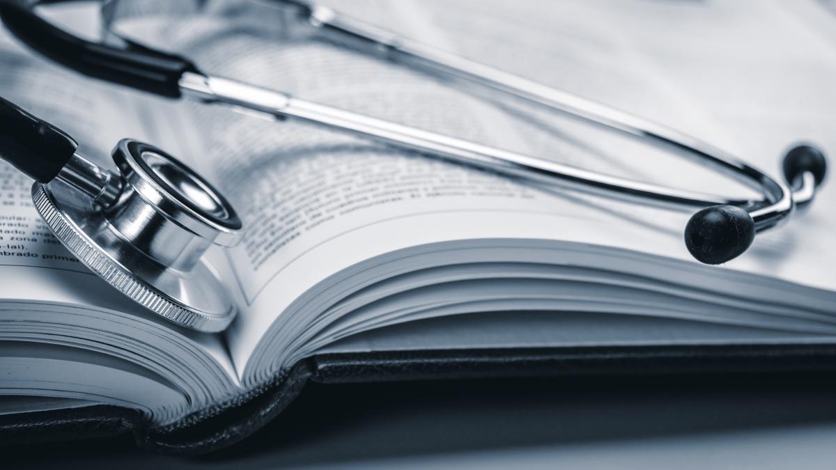 high-angle-view-open-book-table_29733800
