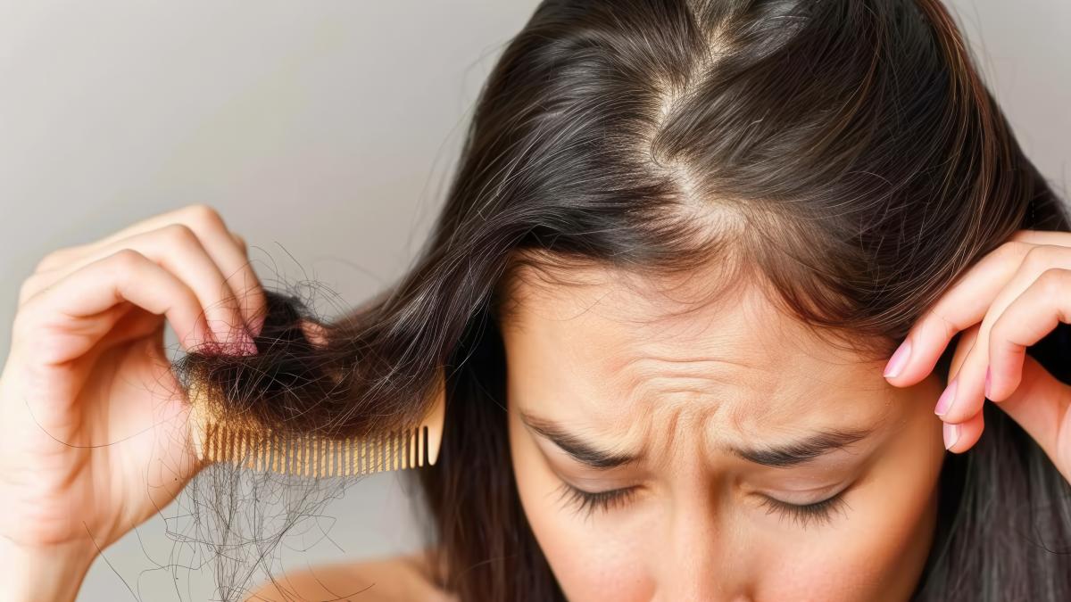 stressed-woman-combing-pulling-her-hair-using-comb-brush-hair-falling-condition_16511800